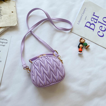 Κομψή παιδική στρόγγυλη τσάντα απλό μοντέλο για κορίτσια