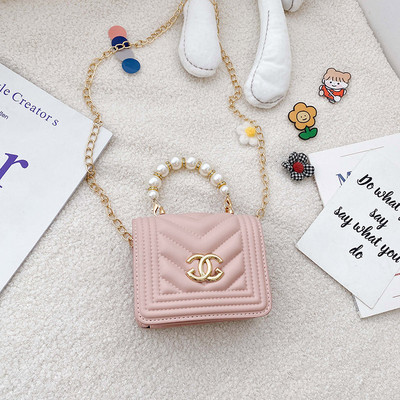 Šiuolaikinė vaikiška mini rankinė su sagtimi ir dekoratyviniais perlais