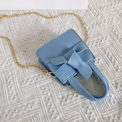 Moodne lühikese ja pika sangaga lastekott tavaline mudel