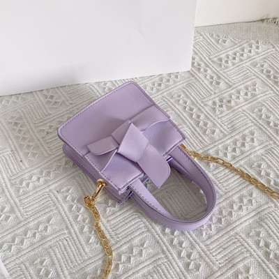 Moodne lühikese ja pika sangaga lastekott tavaline mudel