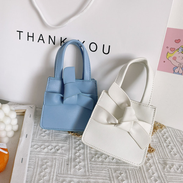 Moodne lühikese ja pika sangaga lastekott tavaline mudel