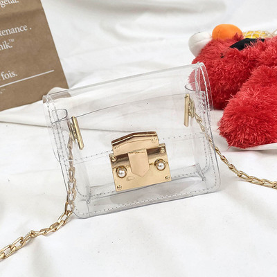 Κομψή παιδική τσάντα με μακριά μεταλλική λαβή