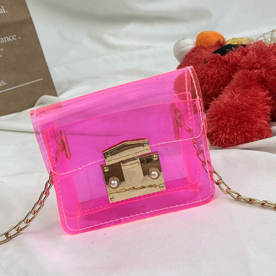 Κομψή παιδική τσάντα με μακριά μεταλλική λαβή