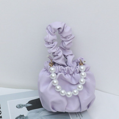 Stiilne lühikeste ja pikkade sangadega ning dekoratiivpärlitega lastekott