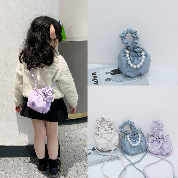 Stiilne lühikeste ja pikkade sangadega ning dekoratiivpärlitega lastekott