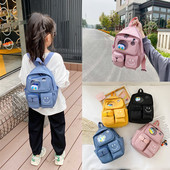 Kaasaegne taskute ja lühikese sangaga laste seljakott