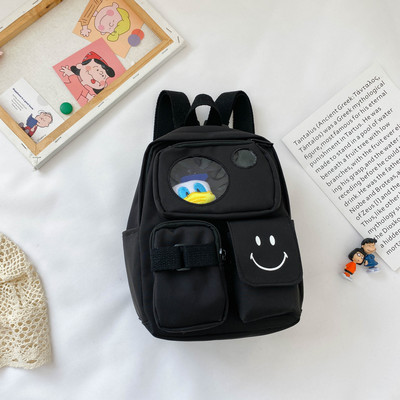 Kaasaegne taskute ja lühikese sangaga laste seljakott