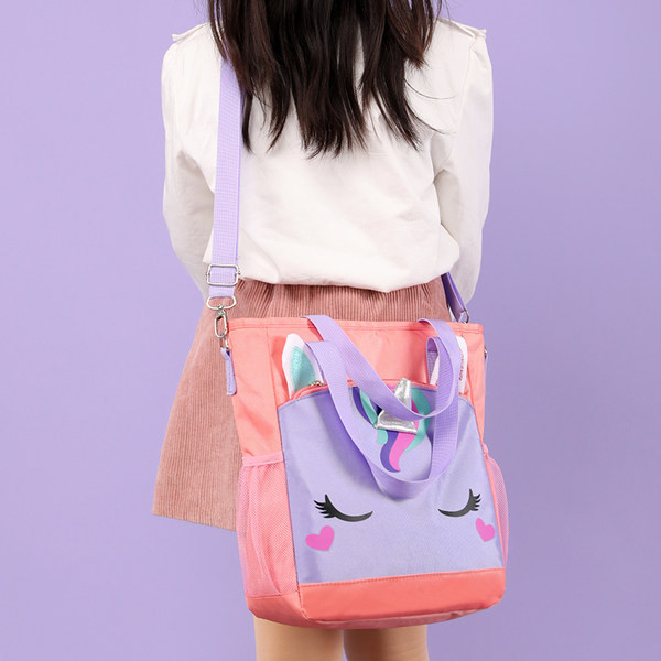 Κομψή παιδική τσάντα με κοντή και μακριά λαβή και τρισδιάστατα στοιχεία