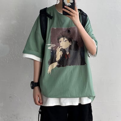 Φαρδύ μπλουζάκι με απλικέ και στρογγυλή λαιμόκοψη