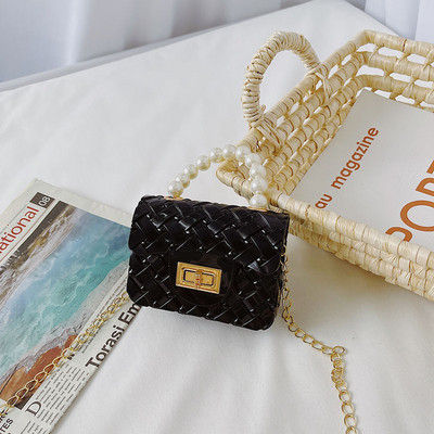 Κομψή μίνι παιδική τσάντα απλό μοντέλο με κοντή και μακριά λαβή