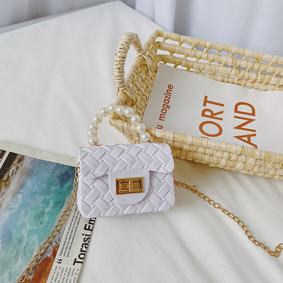 Κομψή μίνι παιδική τσάντα απλό μοντέλο με κοντή και μακριά λαβή