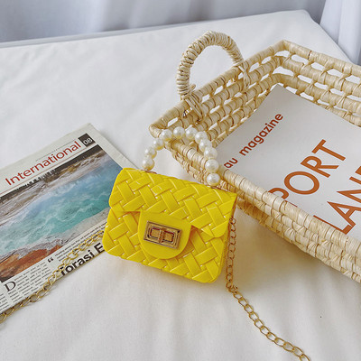 Κομψή μίνι παιδική τσάντα απλό μοντέλο με κοντή και μακριά λαβή