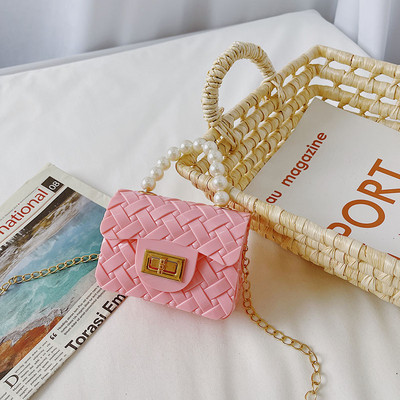 Κομψή μίνι παιδική τσάντα απλό μοντέλο με κοντή και μακριά λαβή