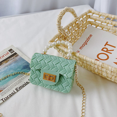 Κομψή μίνι παιδική τσάντα απλό μοντέλο με κοντή και μακριά λαβή