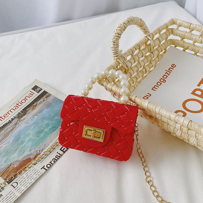 Κομψή μίνι παιδική τσάντα απλό μοντέλο με κοντή και μακριά λαβή