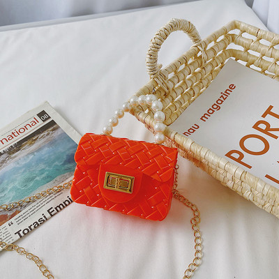 Κομψή μίνι παιδική τσάντα απλό μοντέλο με κοντή και μακριά λαβή