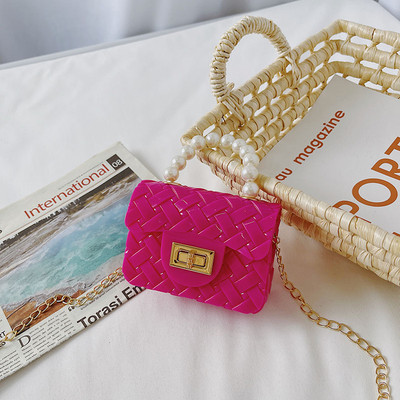 Κομψή μίνι παιδική τσάντα απλό μοντέλο με κοντή και μακριά λαβή