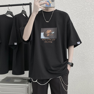 Φαρδύ μπλουζάκι με έγχρωμο απλικέ και 3/4 μανίκια