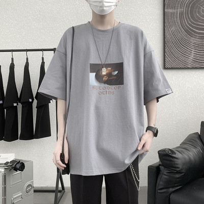 Φαρδύ μπλουζάκι με έγχρωμο απλικέ και 3/4 μανίκια