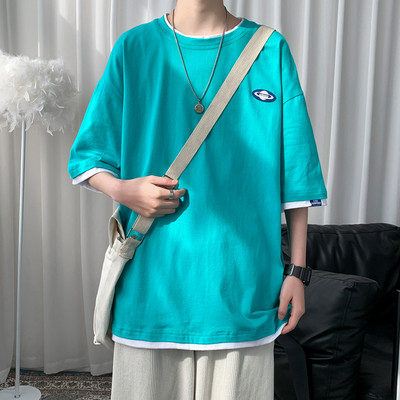 Φαρδύ μπλουζάκι με απλικέ και 3/4 μανίκια