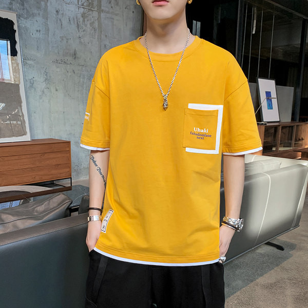 Μοντέρνο μπλουζάκι με τσέπη και κοντά μανίκια