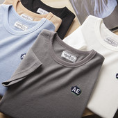 Meeste lühikeste varrukate ja tikandiga T-särk