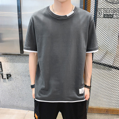 Meeste puuvillane embleemiga T-särk