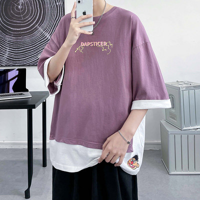 Καλοκαιρινό μπλουζάκι με φαρδύ περικοπή και απλικέ στο πίσω μέρος