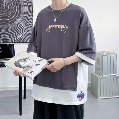 Καλοκαιρινό μπλουζάκι με φαρδύ περικοπή και απλικέ στο πίσω μέρος