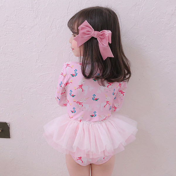 Pikkade varrukatega laste ujumistrikoo tüdrukutele