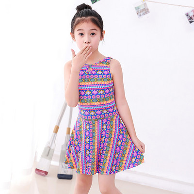 Ristirihmadega laste ujumistrikoo-tüdrukutele