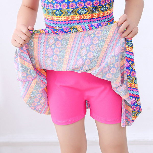 Ristirihmadega laste ujumistrikoo-tüdrukutele