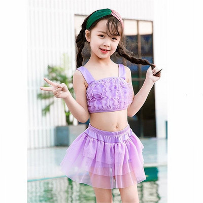 Laste kaheosaline ujumistrikoo lokkidega tüdrukutele