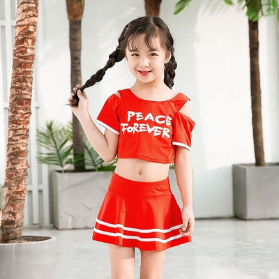 Laste kaheosaline ujumistrikoo lokkidega tüdrukutele