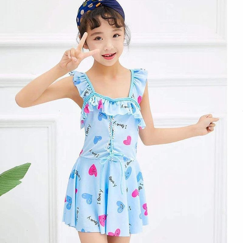 Laste kaheosaline ujumistrikoo lokkidega tüdrukutele