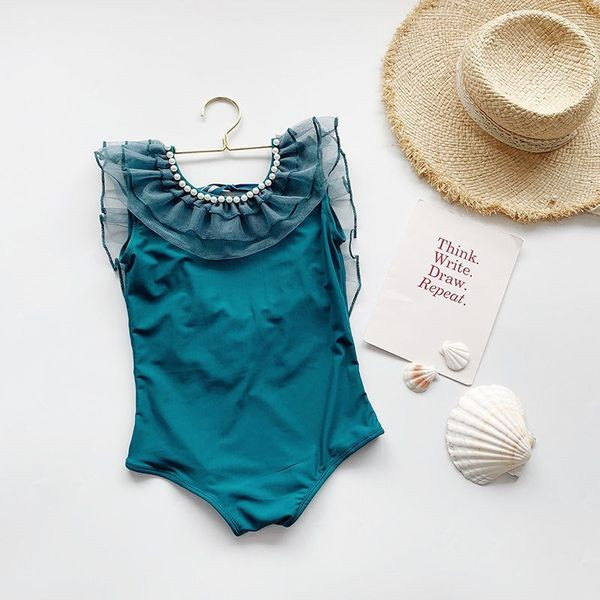 Terve laste ülikond lokkide ja pärlitega - rohelist värvi