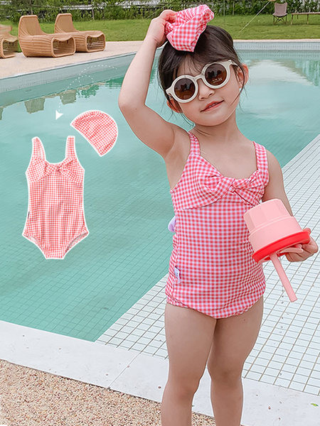 Ruuduline terve laste ujumistrikoo tüdrukutele, mille seljas on pael