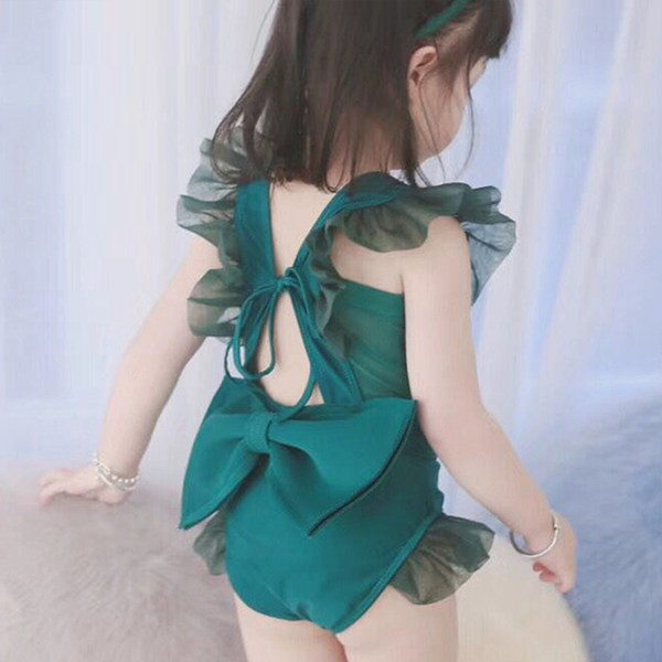 Terve laste ujumistrikoo paela ja lokkidega - rohelist värvi