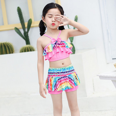 Laste ujumistrikoo kaks mudelit - terve ja kaheosaline