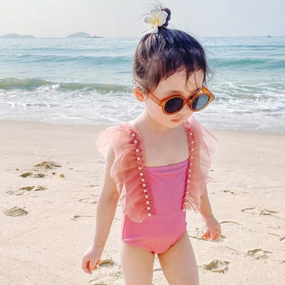 Laste täisujumistrikoo tülli ja pärlitega