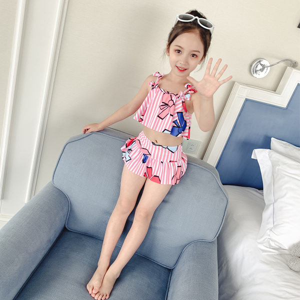 Värvilise mustriga laste ujumistrikoo