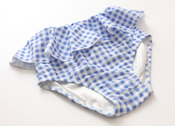 Kolmeosaline laste ujumistrikoo, mis sobib tüdrukutele