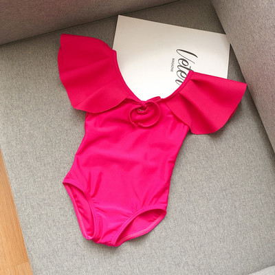 Laste lokkide ja paelaga täisujumistrikoo