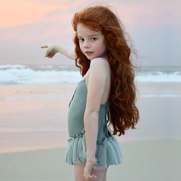 Terve laste ujumistrikoo lokkidega tüdrukutele