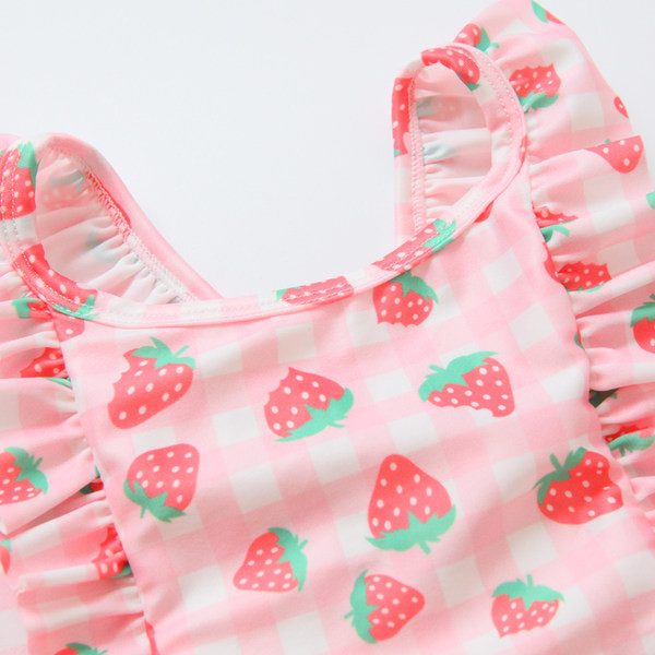 Laste lokkide ja värvilise aplikatsiooniga ujumistrikoo