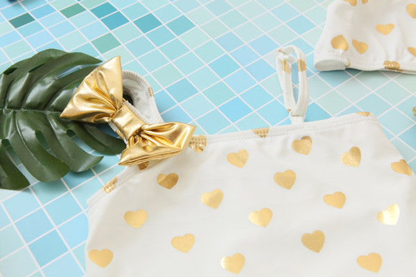 Tülliga laste ujumistrikoo - kaks tüdrukutele sobivat mudelit