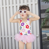 Lillemustriga laste täisujumistrikoo