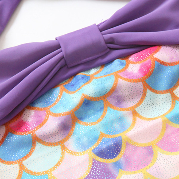 Kahes värvitoonis paela ja lipsudega laste ujumistrikoo