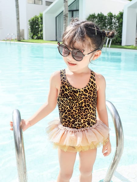 Leopardimustriga ja ristrihmadega laste täisujumistrikoo