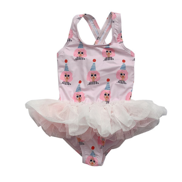 Цял бански костюм с тюлена пола и кръстосани презрамки 